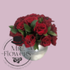 Arreglo Floral con 24 Rosas Rojas en Base Espejo