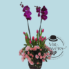 Arreglo Floral con Tulipanes, Orquídeas, y Mini rosas rosa
